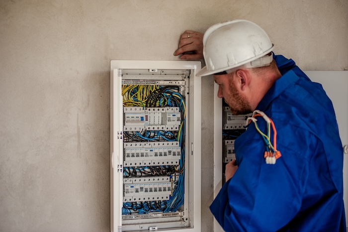 Gauteng Electrical technician performing electrical services on distribution board in Gauteng